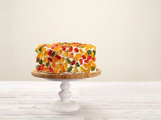 A cake garnished with gummy bears.