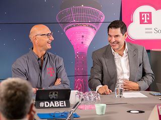 Timotheus Höttges and Marcelo Claure.